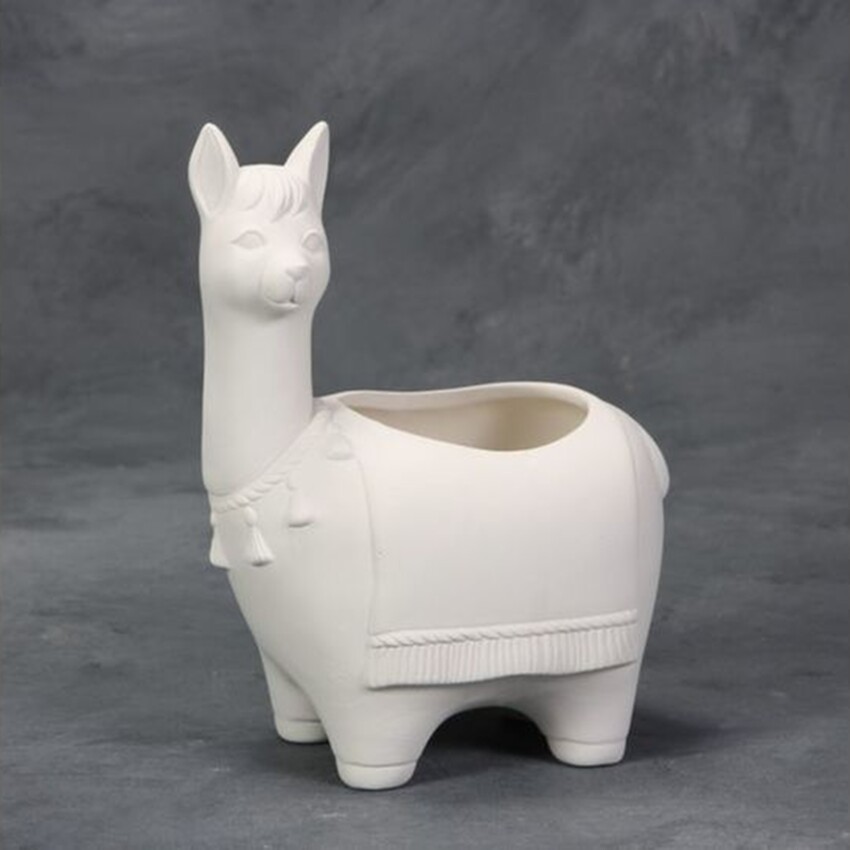 Photograph: Bisque Llama Container by Mayco