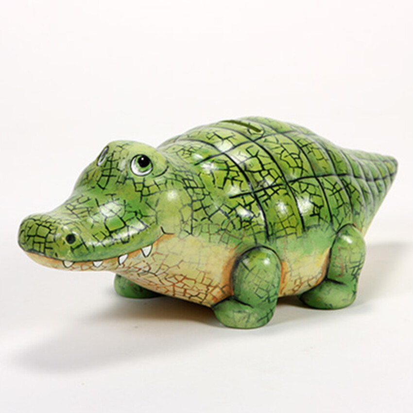 Photograph: Bisque Roly Poly Gator Bank by Mayco