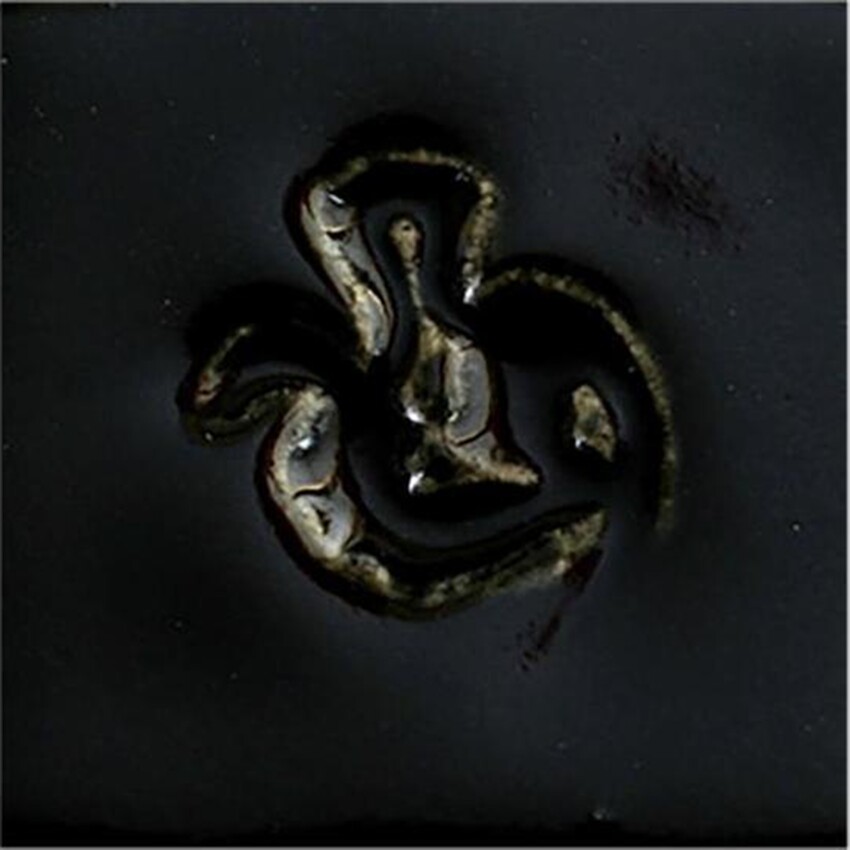 Photograph: Clayscapes Cone 5/6 Glaze: Pitch Black 5lb