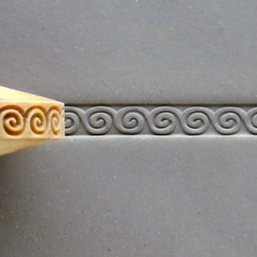 Photograph: Greek Key Spiral Finger Roller