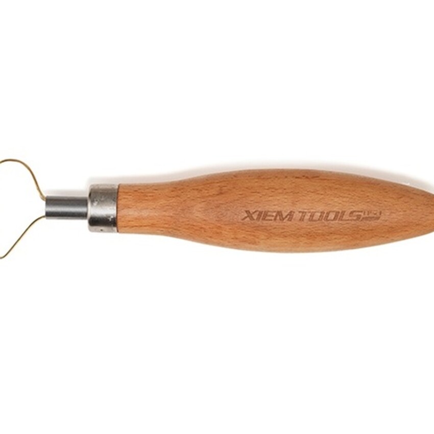 Photograph: Medium Tear Drop Titanium-Fused Pro Trimming Tool with Packaging
