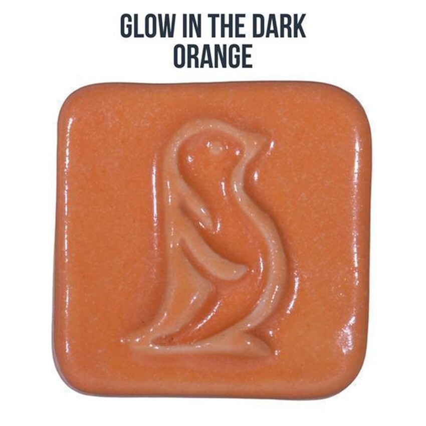 Photograph: Penguin Glow In The Dark ^06 Glaze: Orange 118ml
