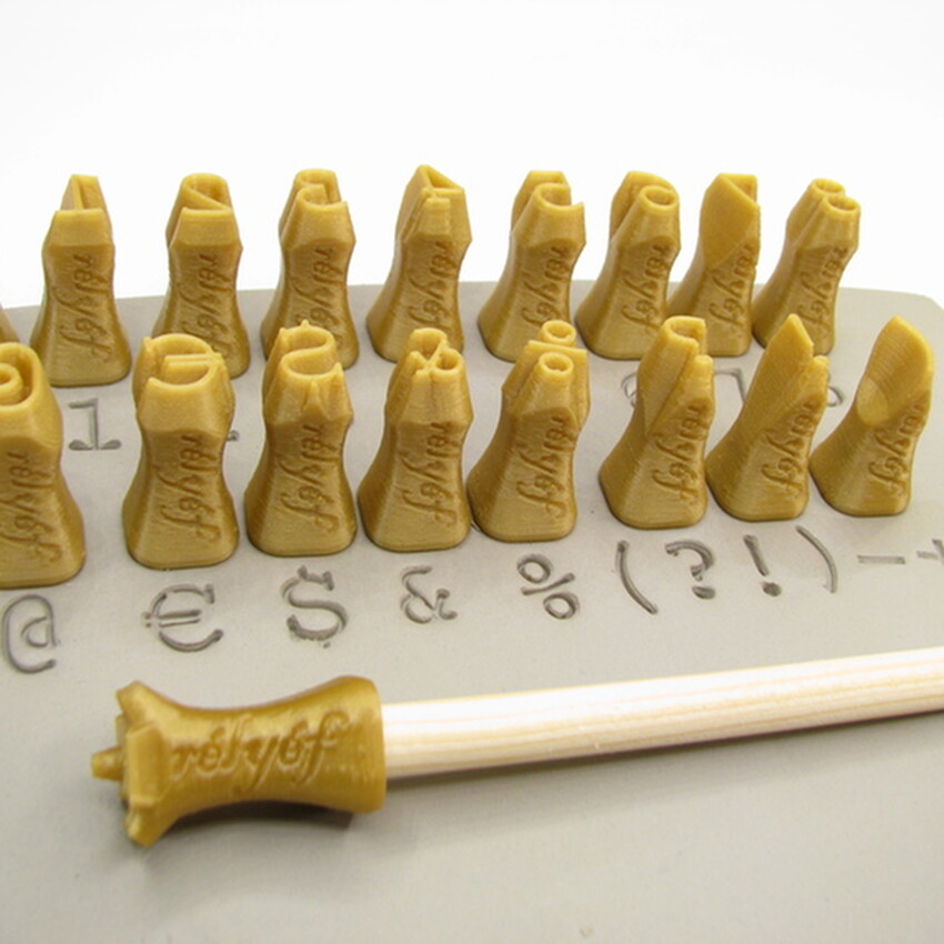 Photograph: Relyef Tools: Numerals 10mm - Courier