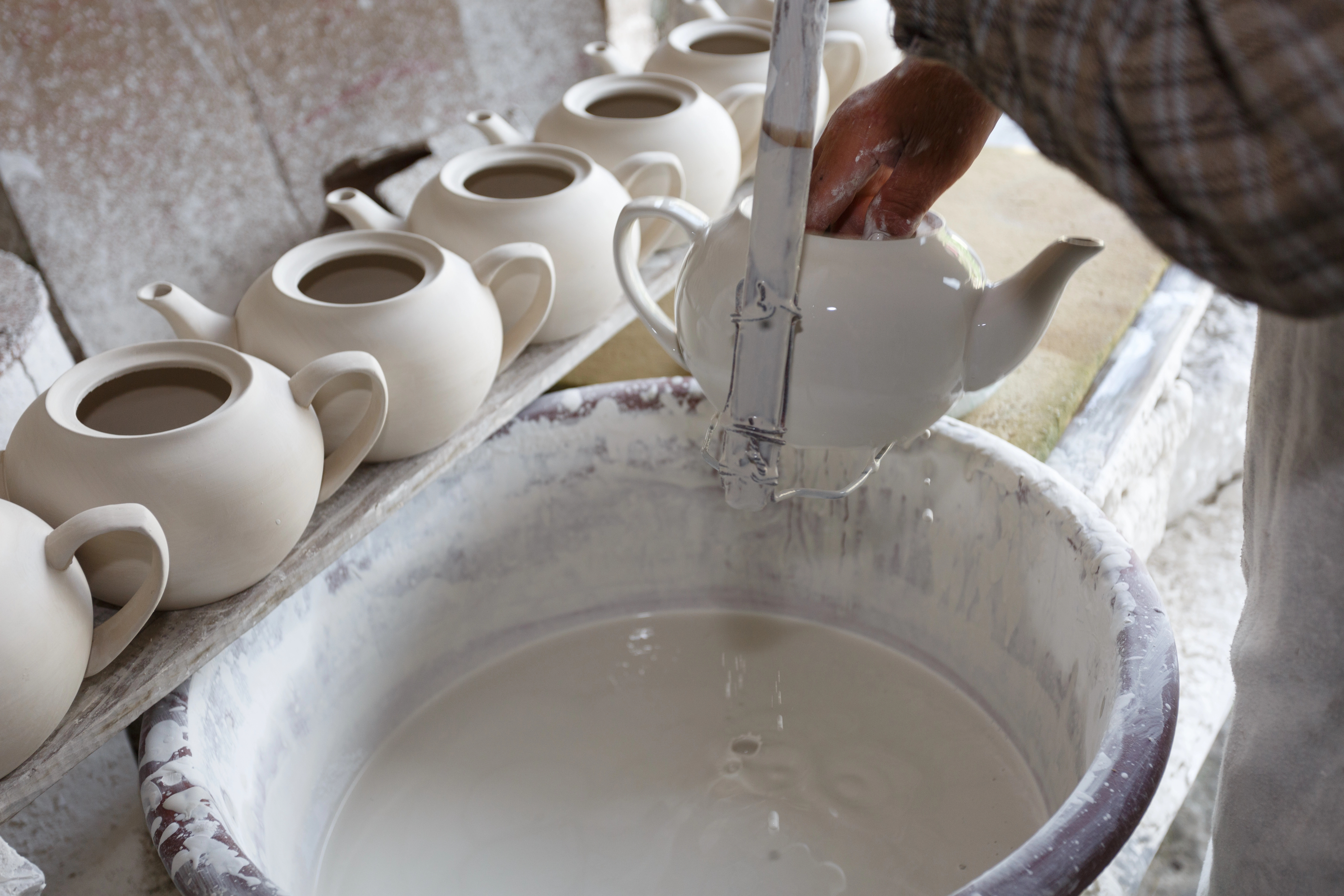 Potter working on project