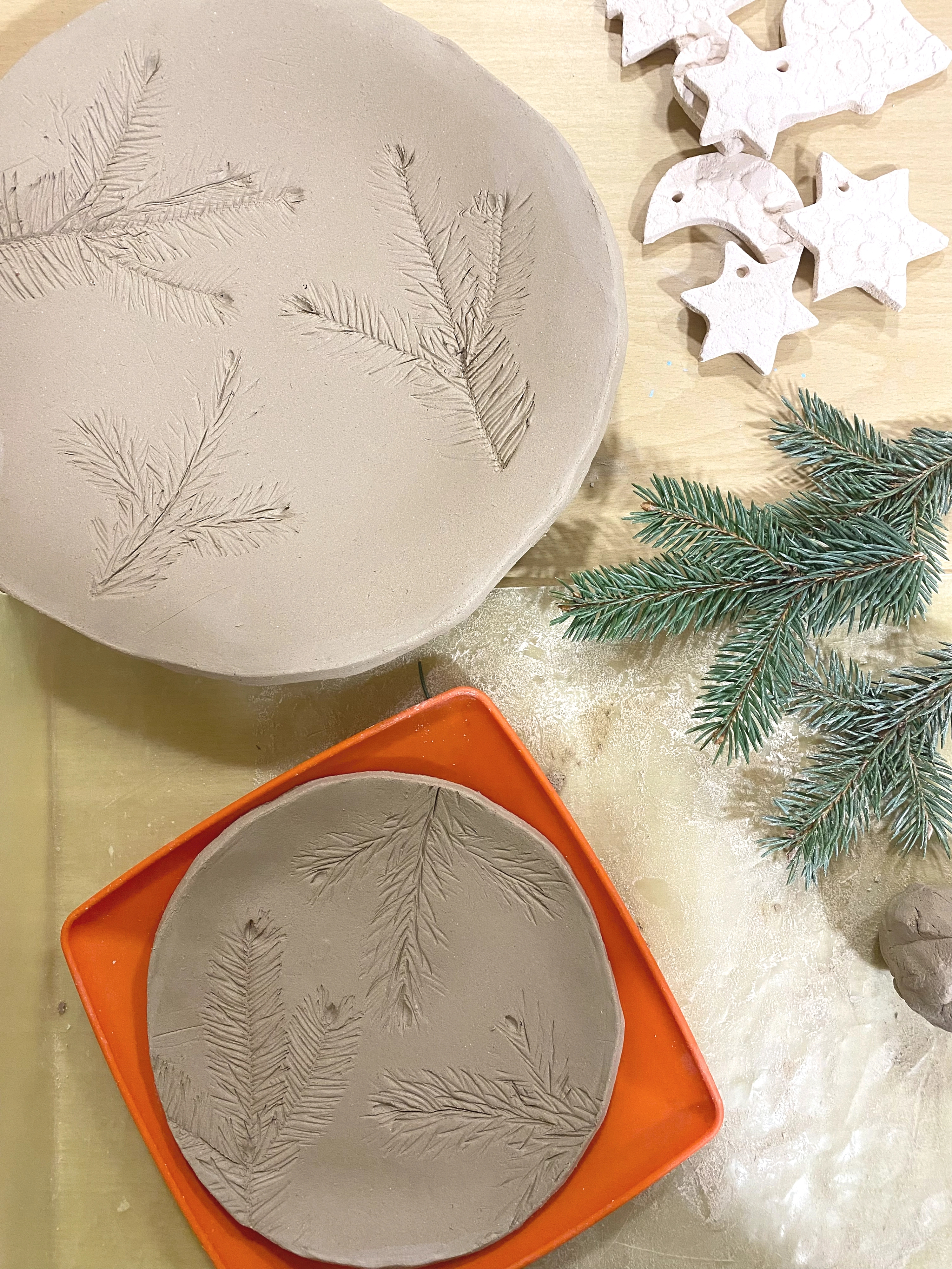 pine embossed clay plates